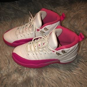 Pink and white Jordan 12's